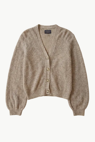 A beige knit cardigan sweater with a V-neck, button-front closure, and textured balloon sleeves, shown flat against a white background.