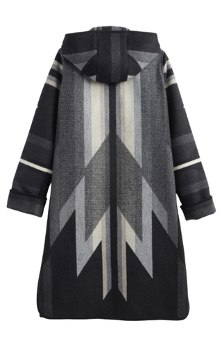 A hooded coat with a geometric pattern in black, gray, and off-white, featuring a central chevron design and striped details on the sleeves.