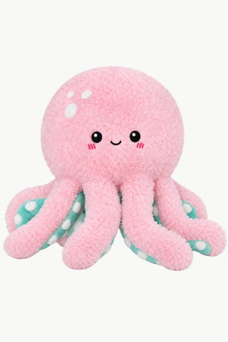 Pink plush octopus toy with a cute face.