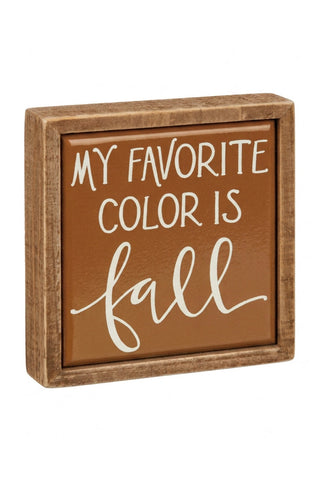 Decorative sign with 'My Favorite Color is Fall' text on a brown background